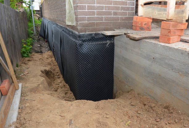 Happy homeowners after waterproofing job in Avon Lake